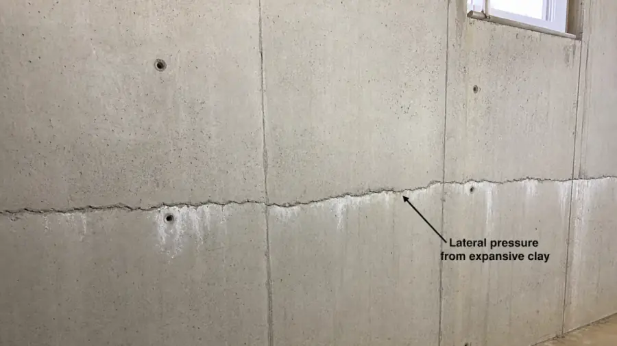 Basement and foundation stresses typical in Bondurant, Iowa — drainage, clay soils, and frost