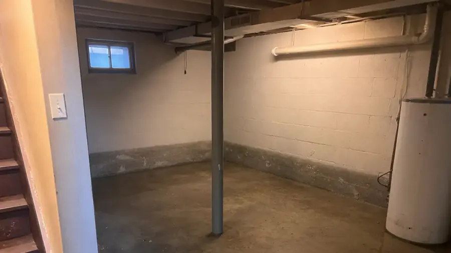 Basement and foundation stresses typical in Cedar Rapids, Iowa — drainage, clay soils, and frost