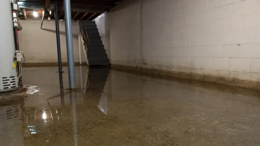 Basement and foundation stresses typical in Coralville, Iowa — drainage, clay soils, and frost