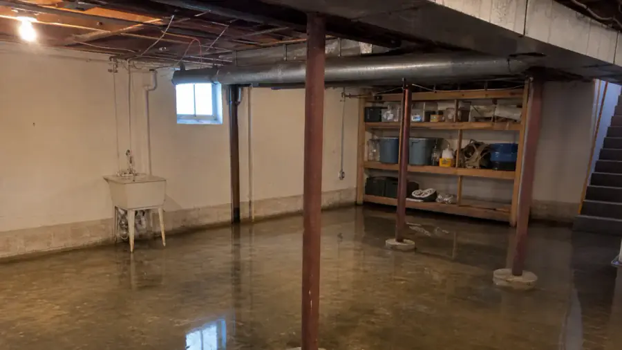 Basement and foundation stresses typical in Iowa City, Iowa — drainage, clay soils, and frost