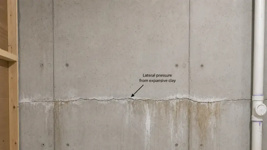 Basement and foundation stresses typical in West Des Moines, Iowa — drainage, clay soils, and frost